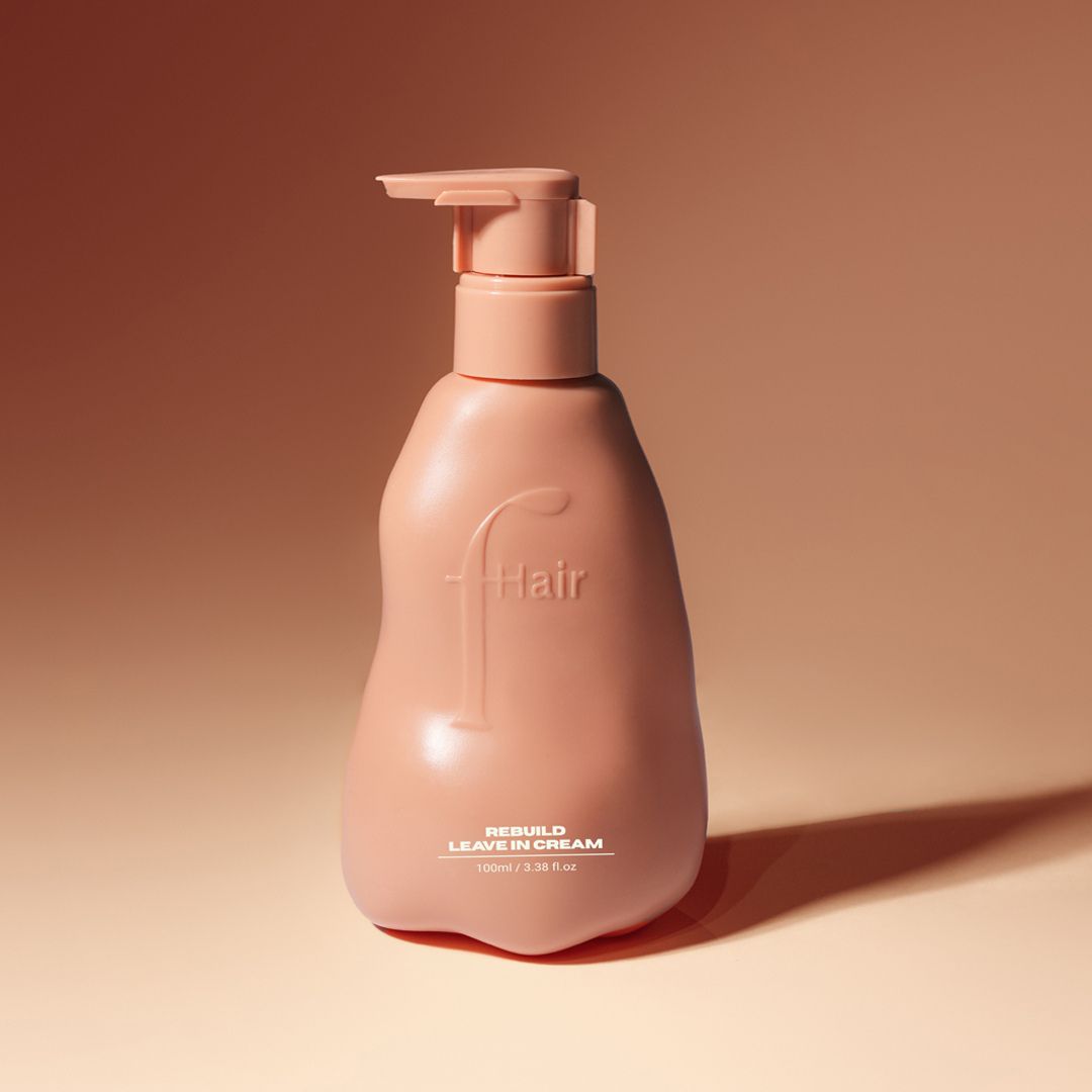 Fhair Rebuild Leave-In Cream 100ml for damaged hair repair. Lightweight, nourishing formula to strengthen, smooth frizz and add shine.