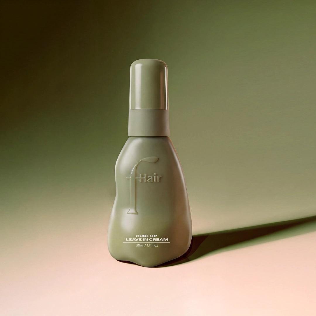 Fhair Curl Up Leave-In Cream for defined, frizz-free curls.