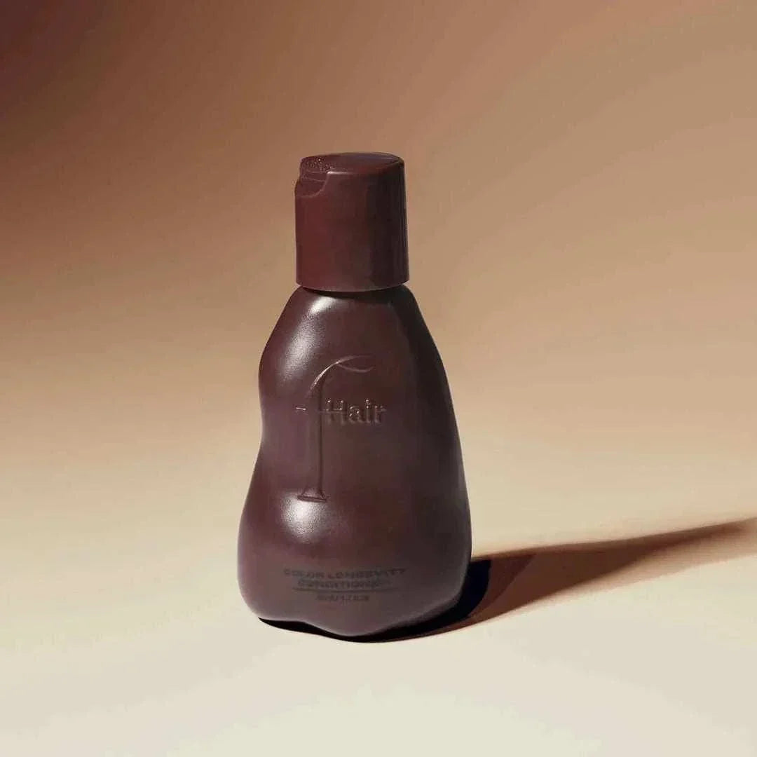 bottle of color longevity conditioner for color-treated hair