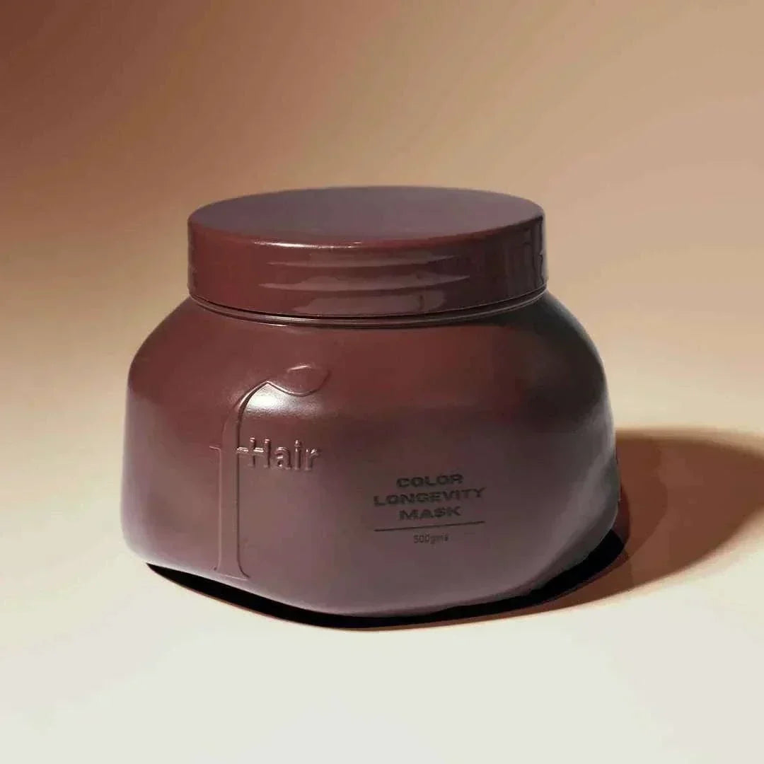 color longevity mask in a matte brown jar packaging designed for color-treated hair care and nourishment