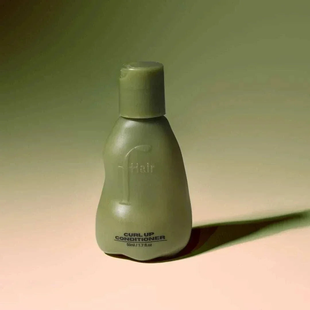 Curl Up Conditioner bottle for defining and hydrating curly hair