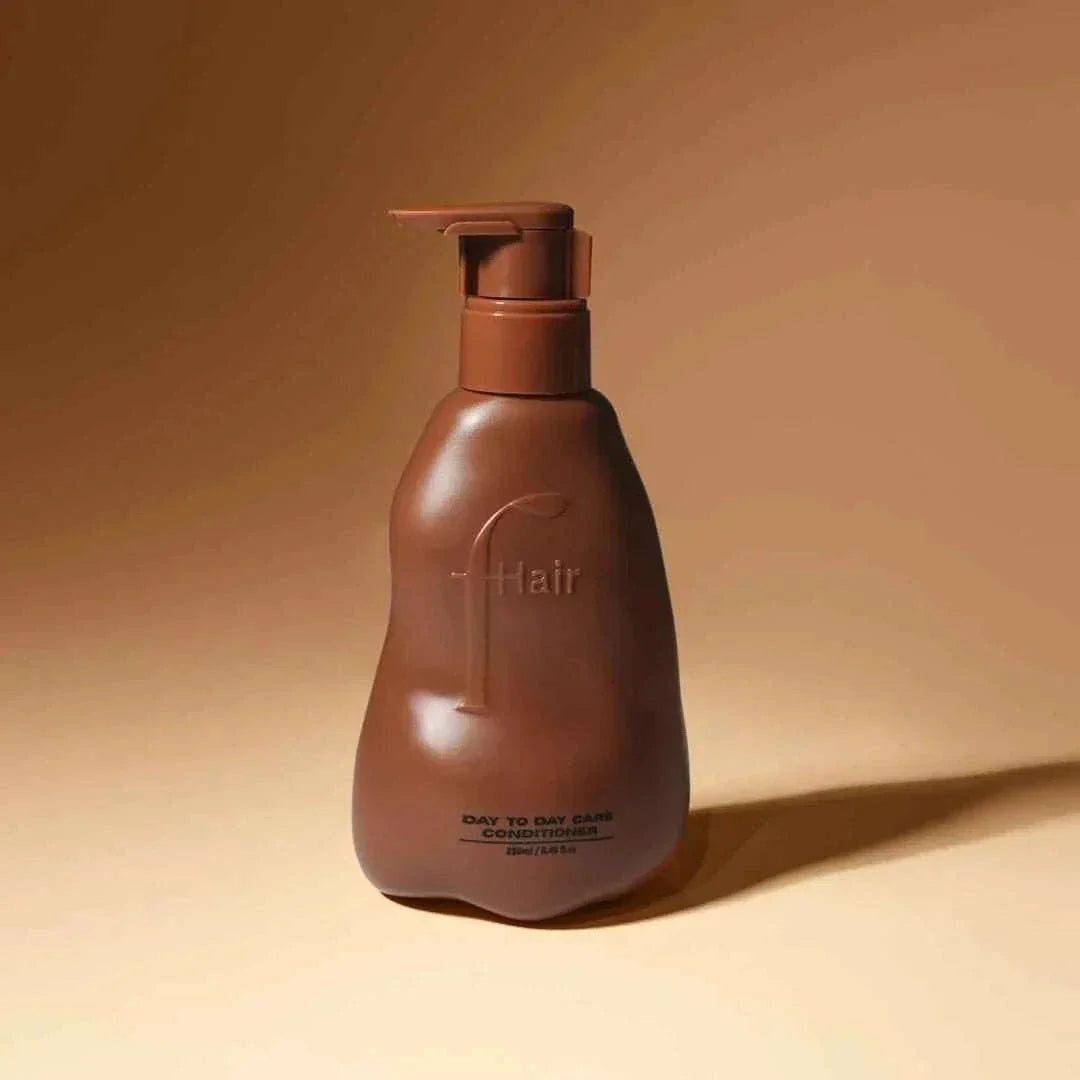 bottle of daily-use conditioner for soft hydrated hair
