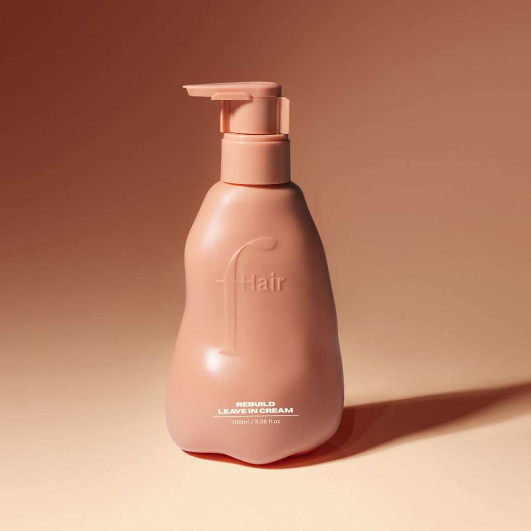 Rebuild leave-in cream for damaged hair repair and frizz control