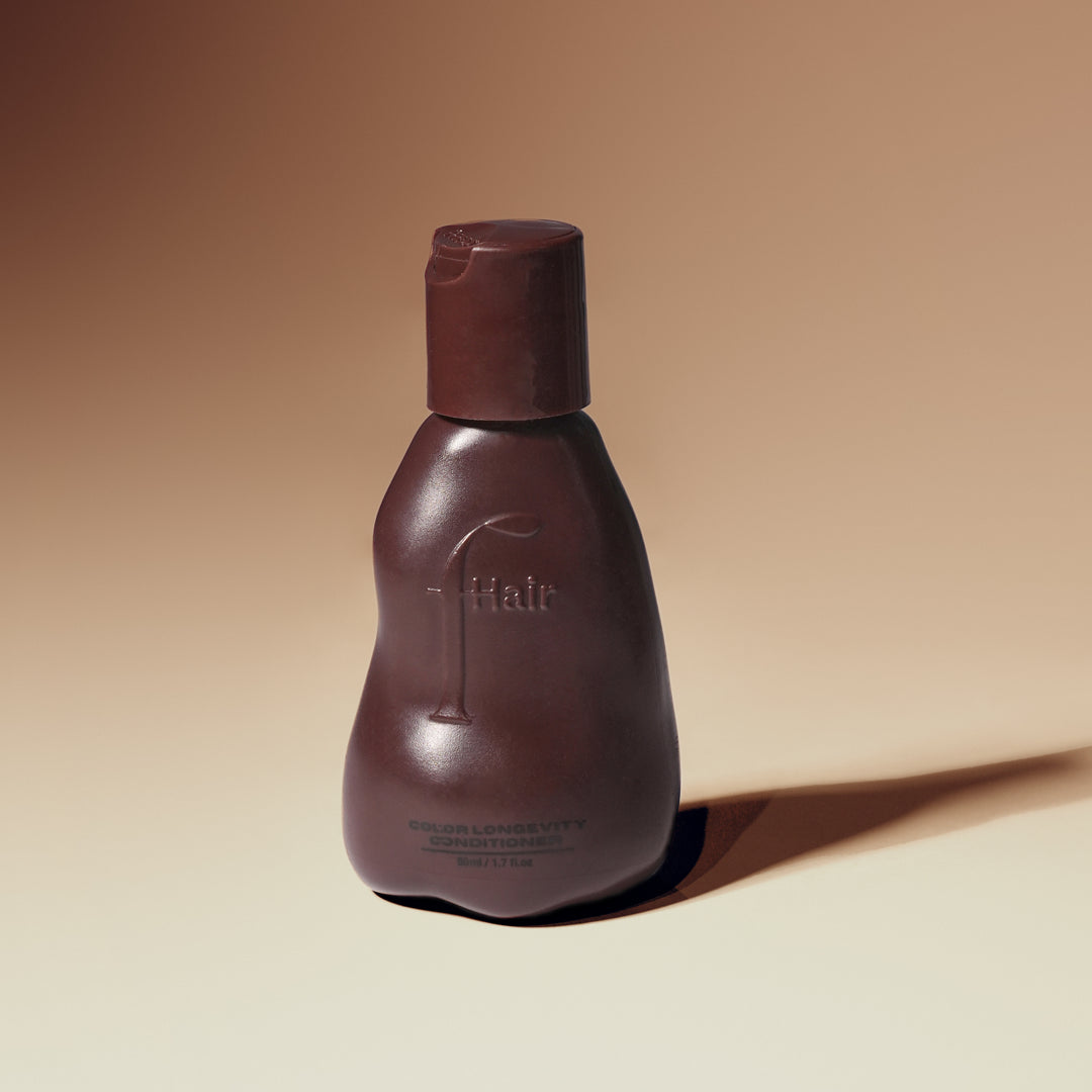 Fhair Color Longevity Conditioner for color-treated hair. Hydrates, protects color and enhances shine for soft, vibrant hair.