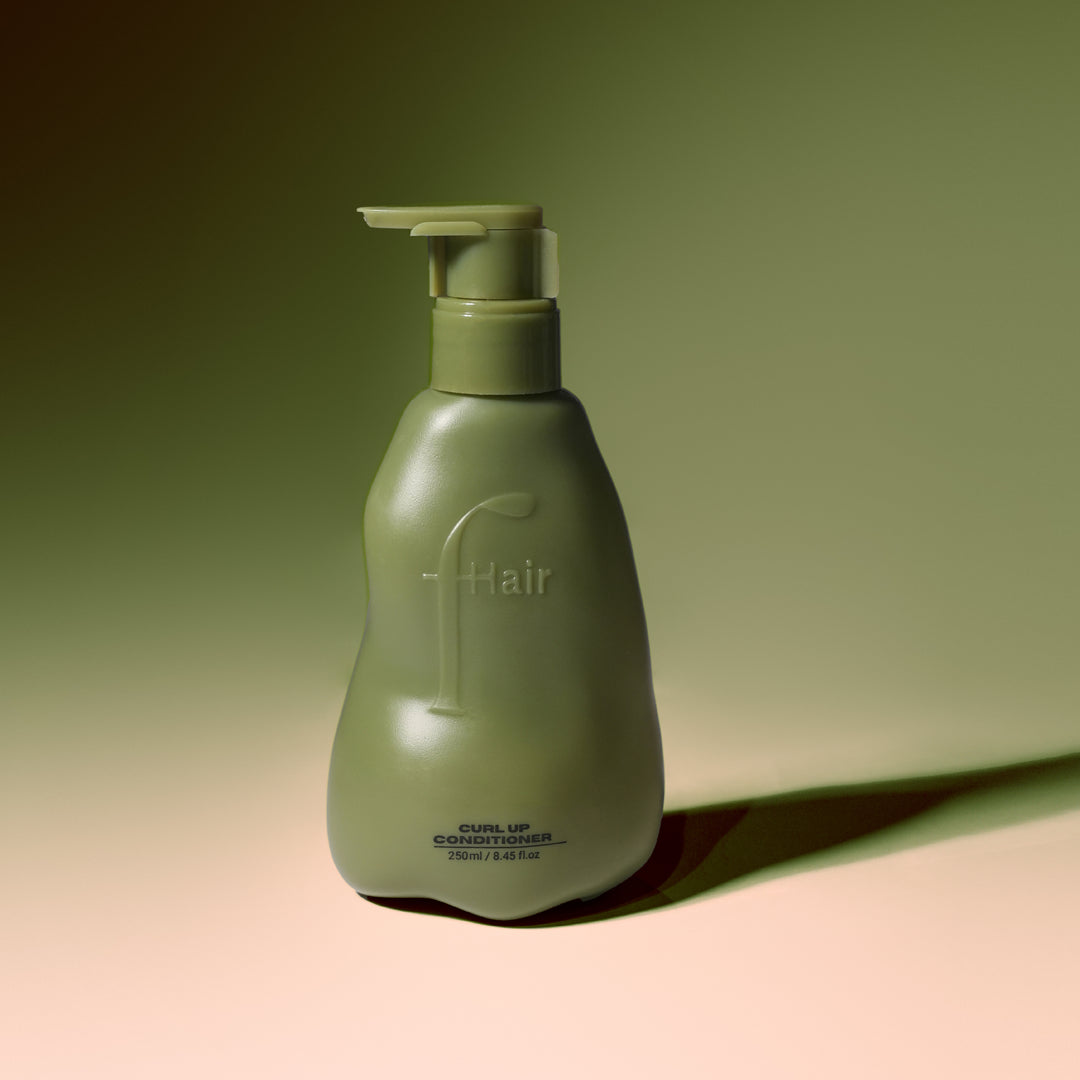 Fhair Curl Up Conditioner 250ml for curly hair. Hydrates, detangles and enhances natural curls for smooth, defined results.