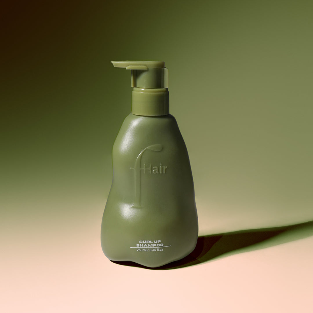 Fhair Curl Up Shampoo 250ml for curly hair. Gently cleanses, hydrates and enhances natural curls for smooth, defined results