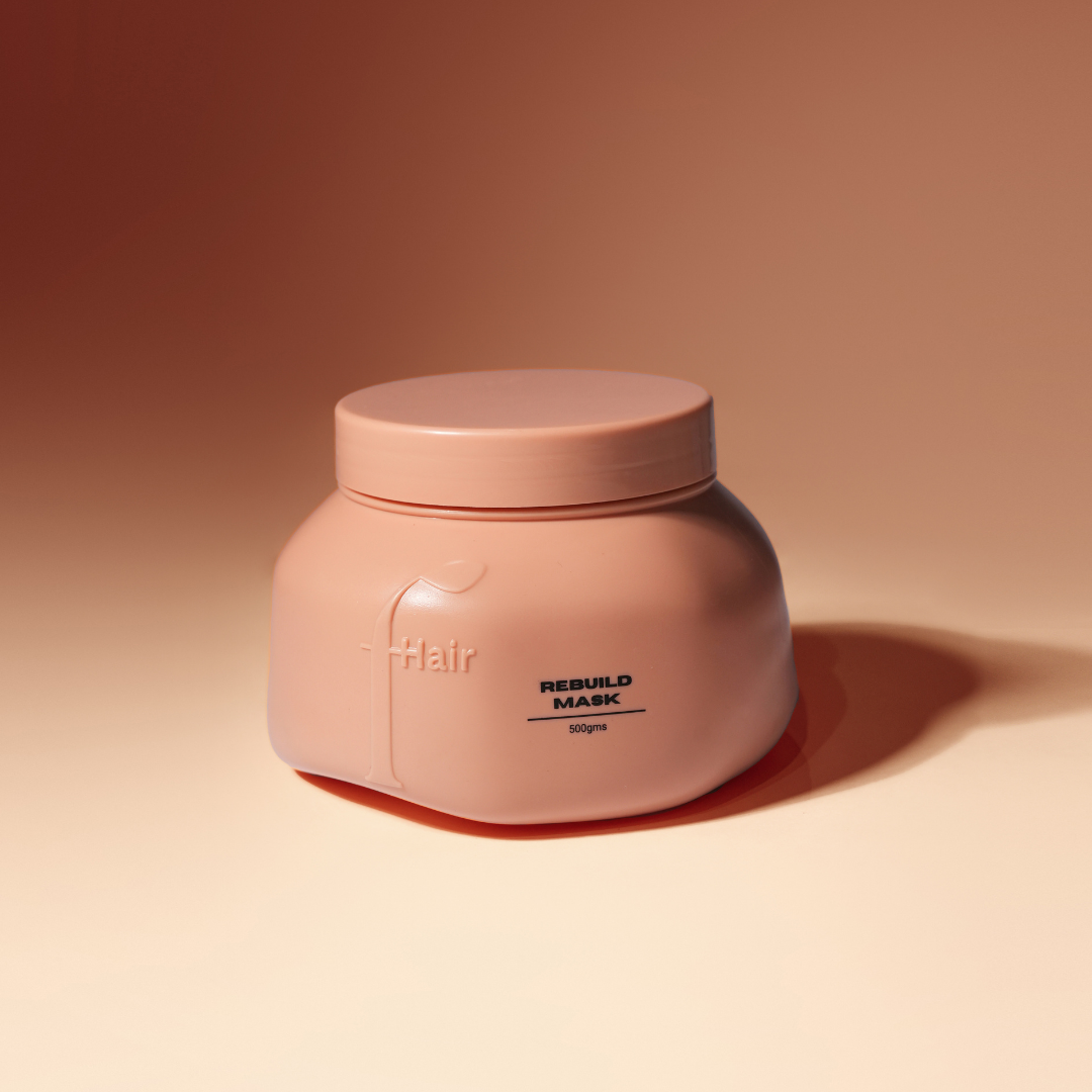 Fhair Rebuild Mask 500g salon size for intensive repair and nourishment. Strengthens damaged hair and restores shine and smoothness.