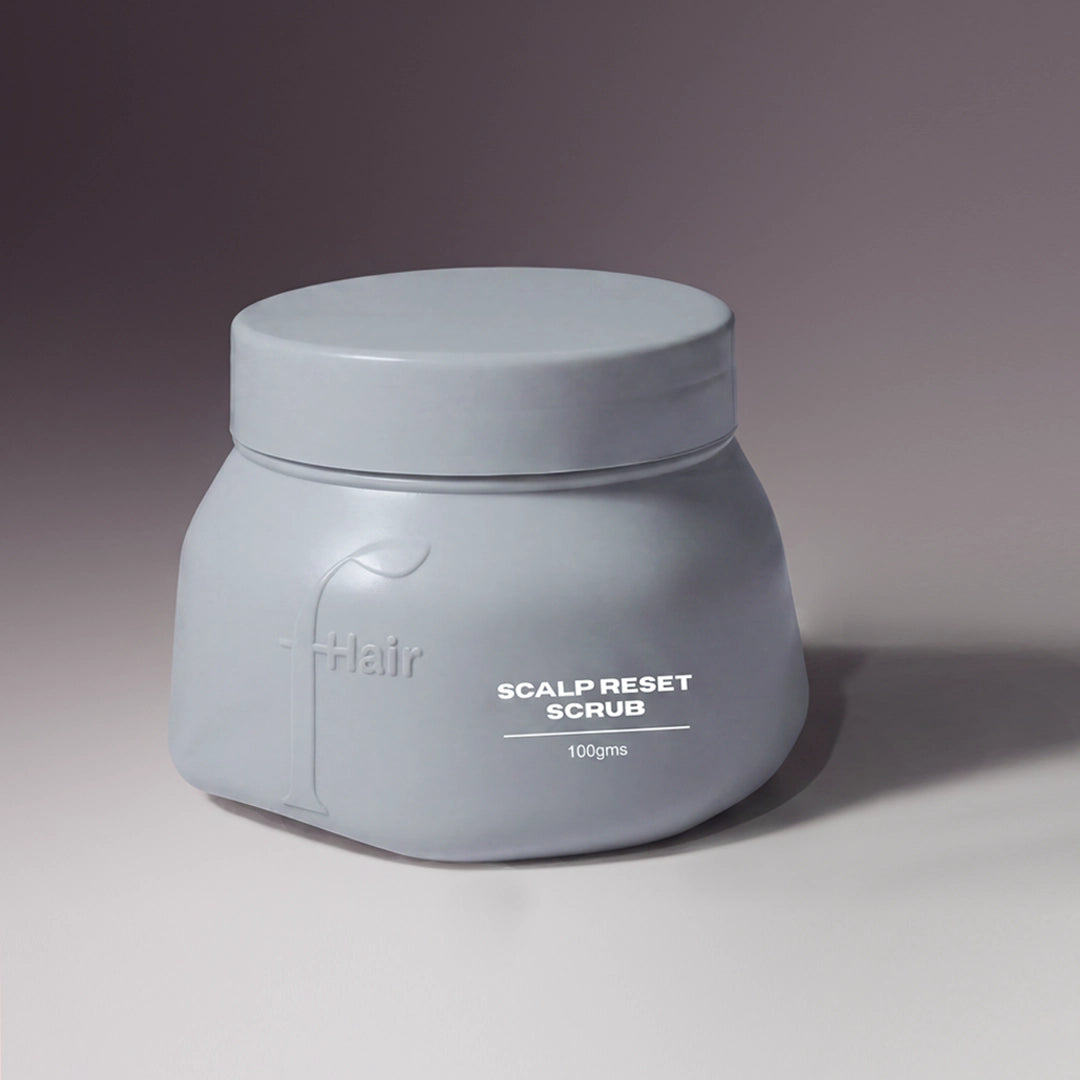 Scalp Reset Scrub – Gentle Desert Salt Scrub for Scalp Buildup in a gray container on a neutral background.
