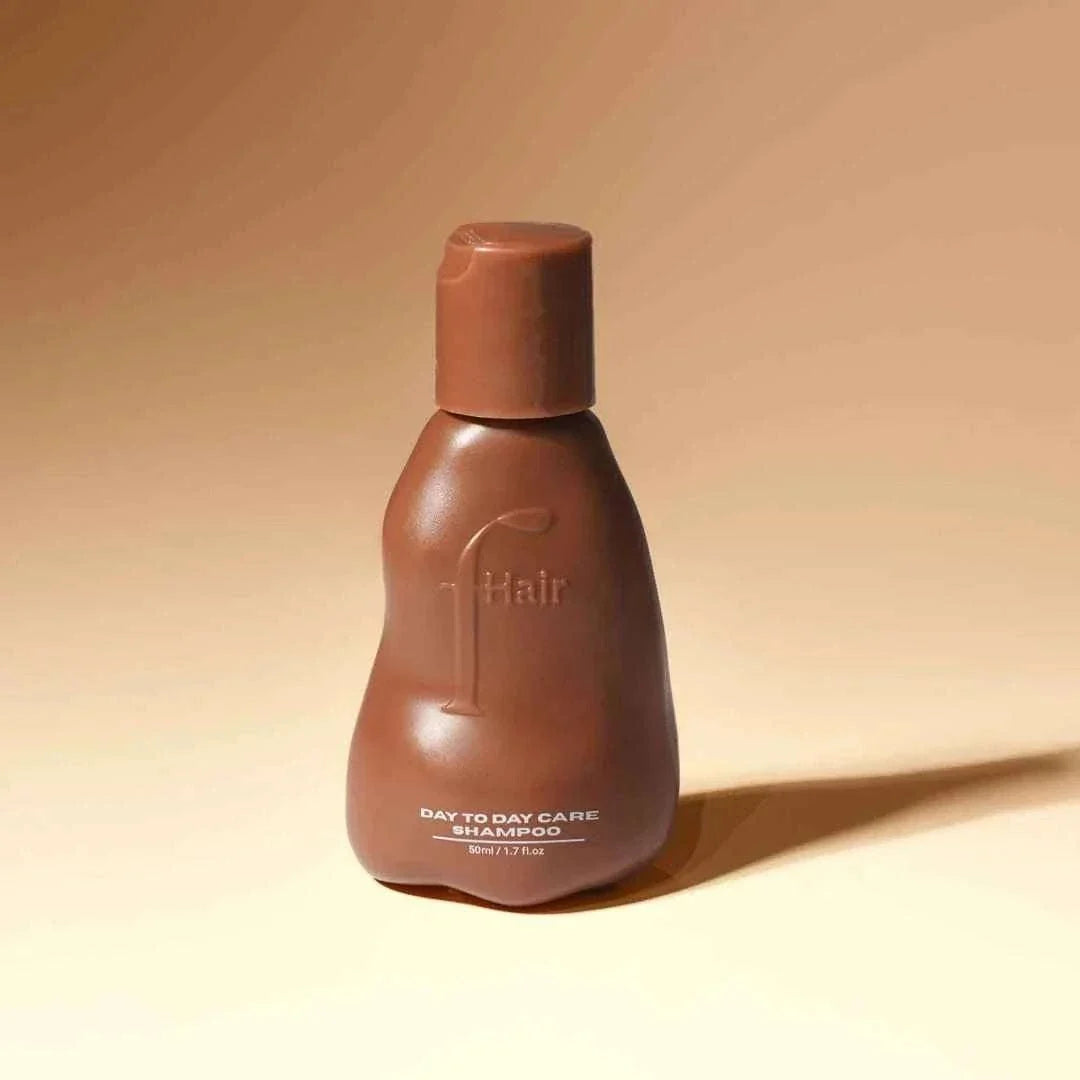 Gentle everyday shampoo bottle for soft, frizz-controlled hair