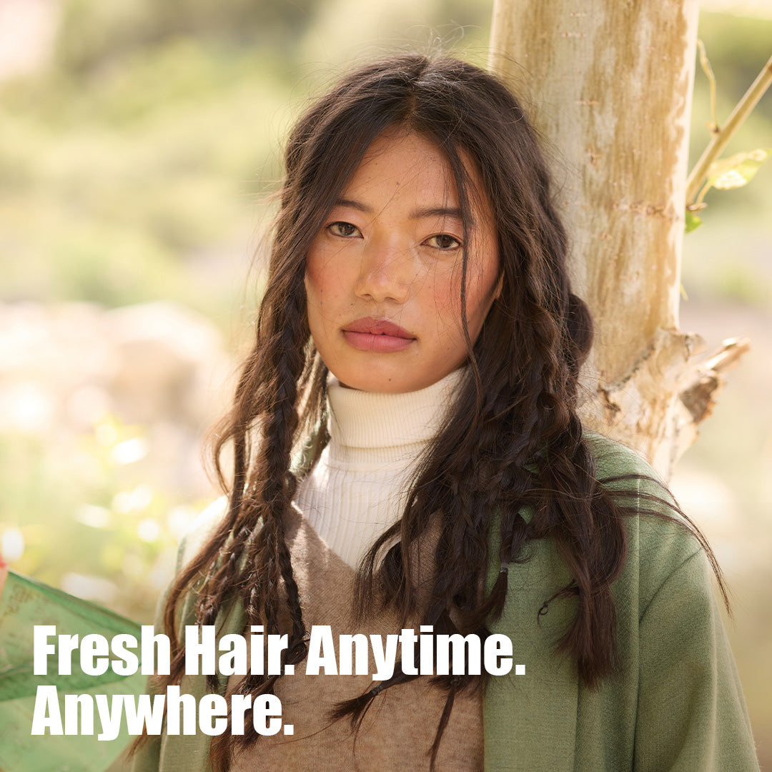 REVIVE charcoal dry shampoo refreshing oily roots and adding volume