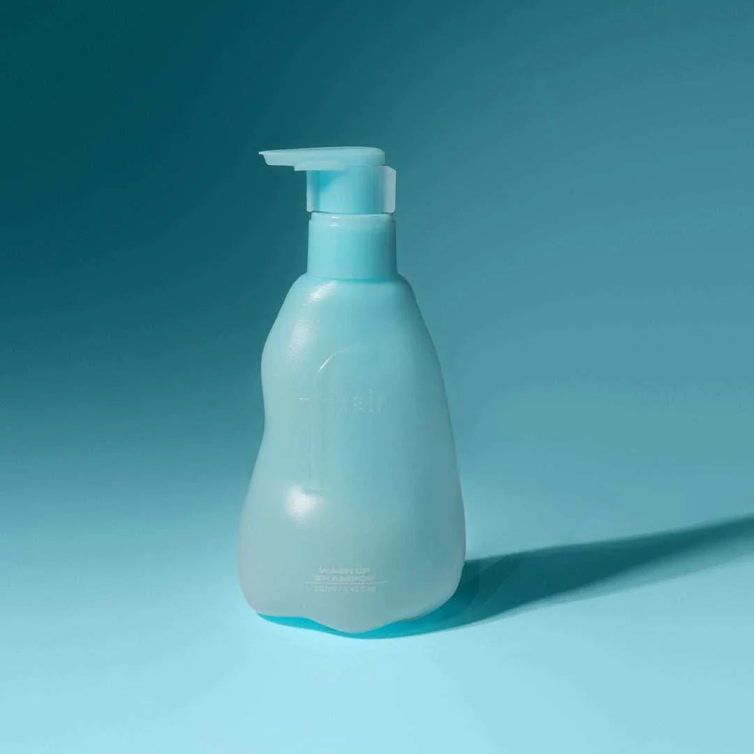 Wash Up Shampoo bottle with clean fresh hair concept
